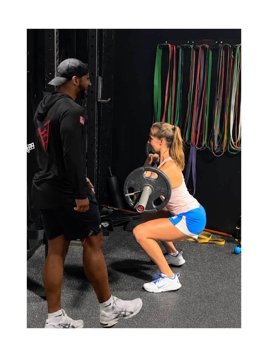 Jaiden Dawkins coaching an athlete